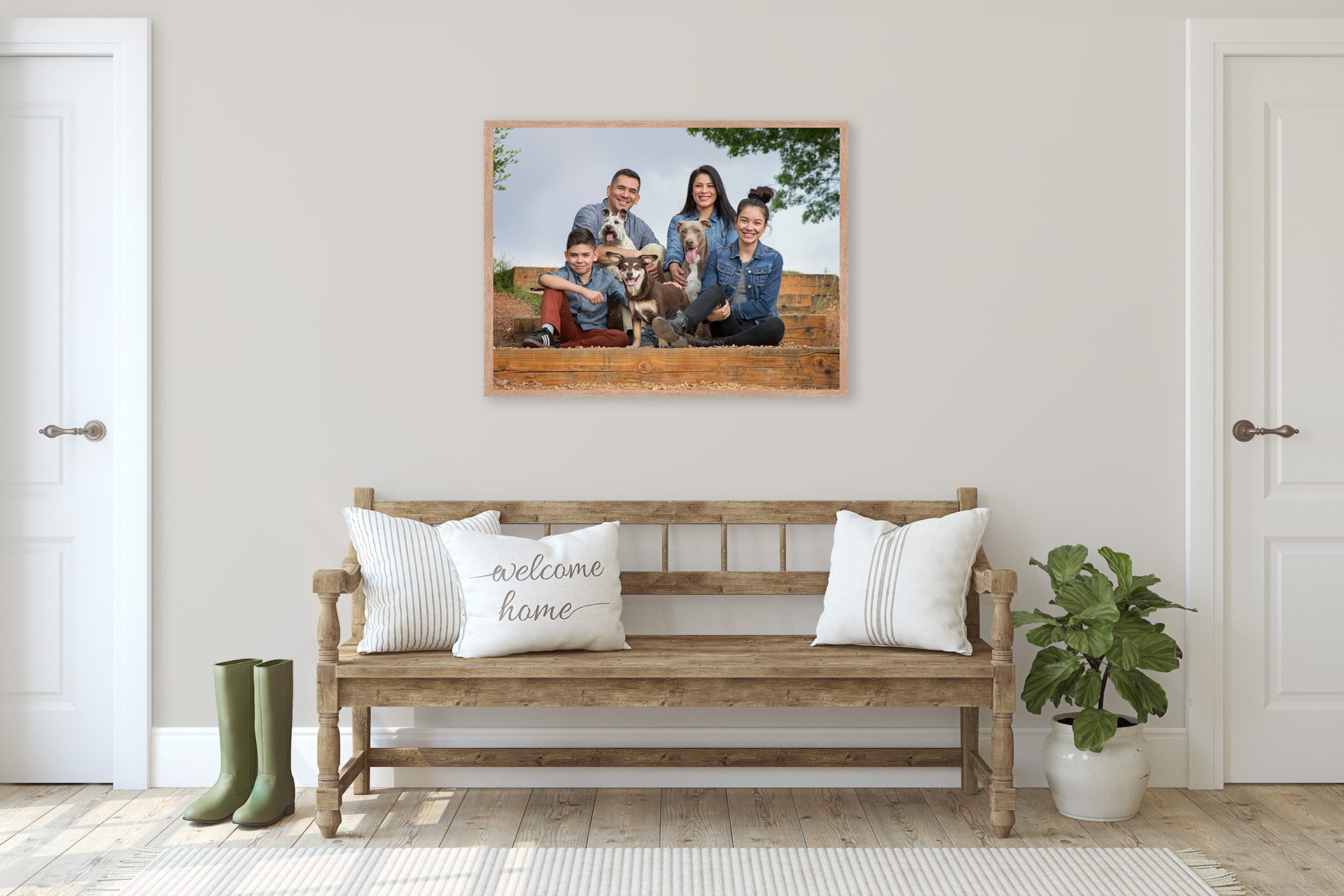Portrait of a family of four with three adopted dogs
