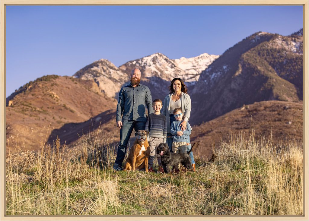 Family portrait with dogs in front of the Wasatch Front, Utah