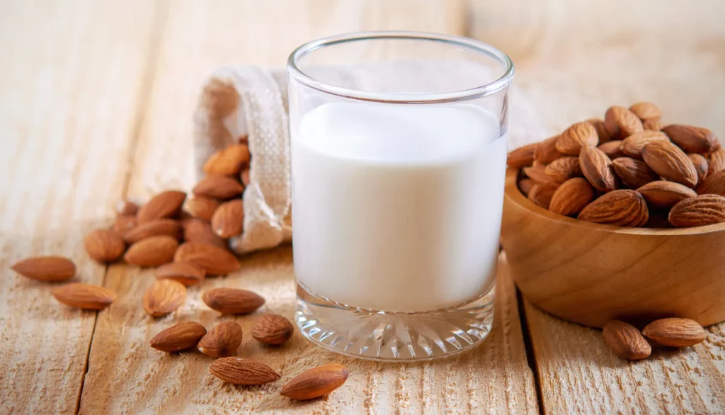 almonds and a glass of almond milk