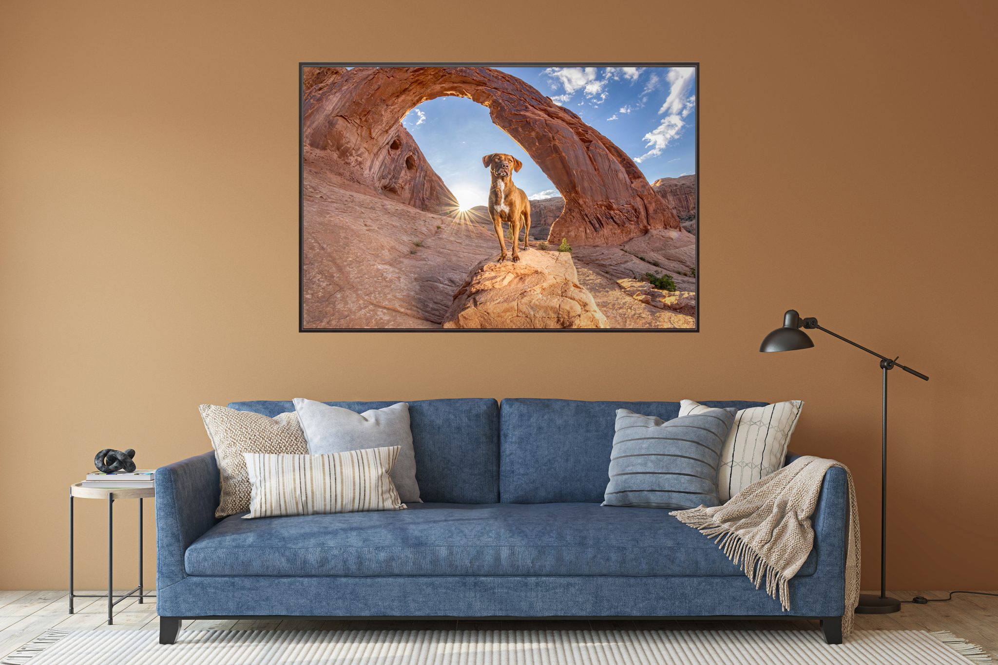 Statement Piece Portrait of Dog Guinness framed by Corona Arch near Moab, Utah in a brown living room over a blue sofa